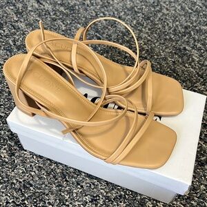 Women tan around the ankle strap heals size 8
